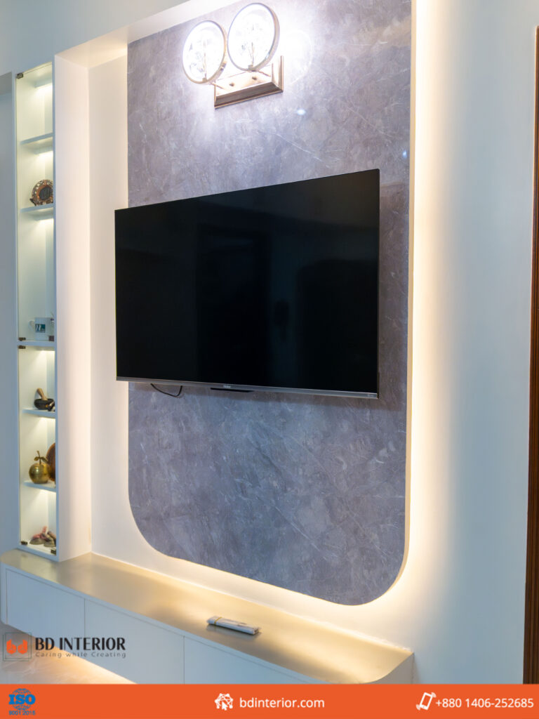 TV Cabinet Buying Guide for Bangladeshi Homes: Custom Designs, Finishes & Price Breakdown 9 Stylish TV wall with decorative clock.