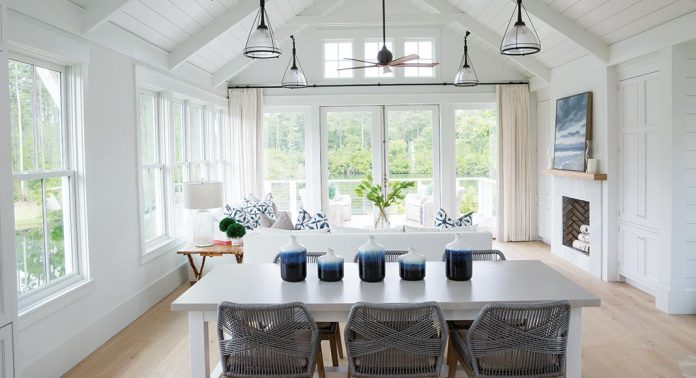 Modern Cottage Interiors: Get Cozy, Bright Style Without the Farmhouse Look! 1 Bright living room with large windows and white de.